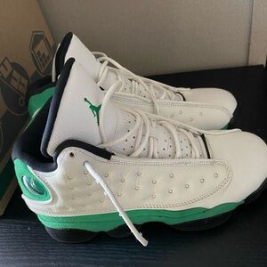 Green and white Jordan 13s Sneakers